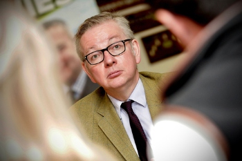Gove threatens to strip councils of planning powers image